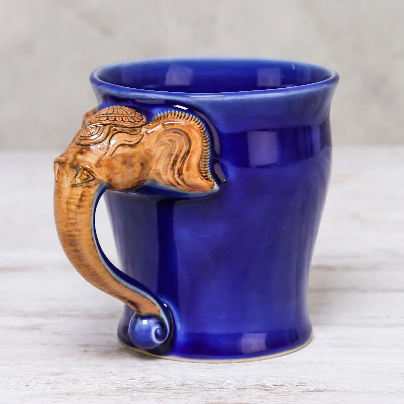 - ​​Pet toys under    yuanElephant Handle in Blue Celadon Ceramic Elephant Mug in Blue from Thailand (10 oz.)